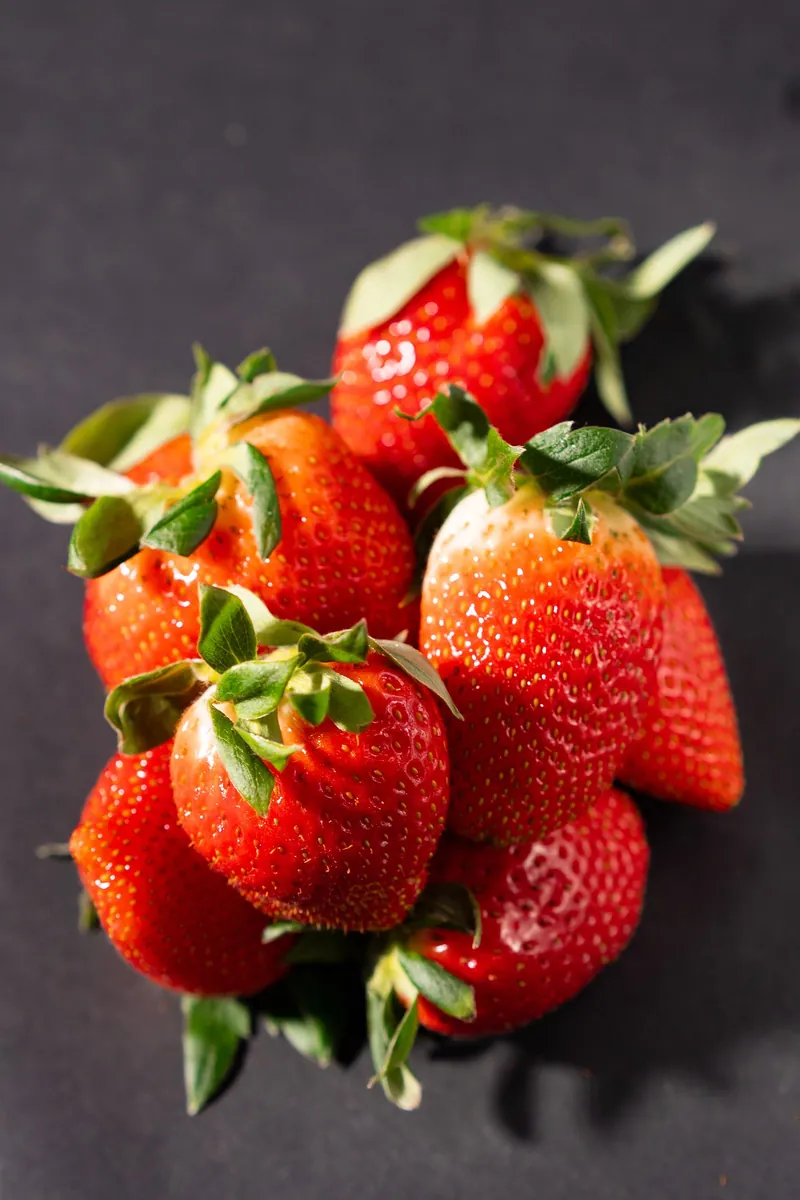 Fresh ripe strawberries at peak season on a fruit season chart